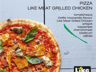 Plant-based pizza met tomatensaus, violife mozzarella, Like Meat, artisjok, kappertjes, cherrytomaat en basilicum.