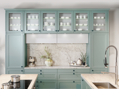 Stijlvolle keuken met mintgroene kasten, marmeren werkblad, inbouwapparatuur en minimalistische decoratie.